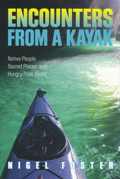Kayak in a cave on the front cover of the book Encounters from a Kayak